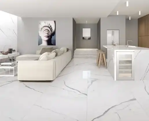 Statuario marble slab with bold grey veining on white surface